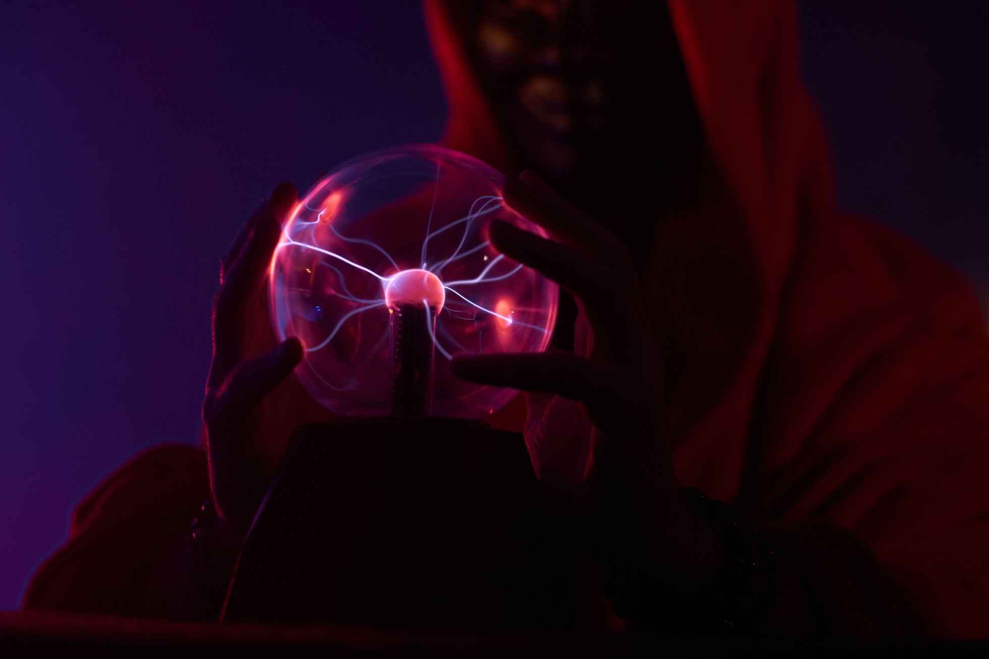 Futuristic shaman is using his magic globe